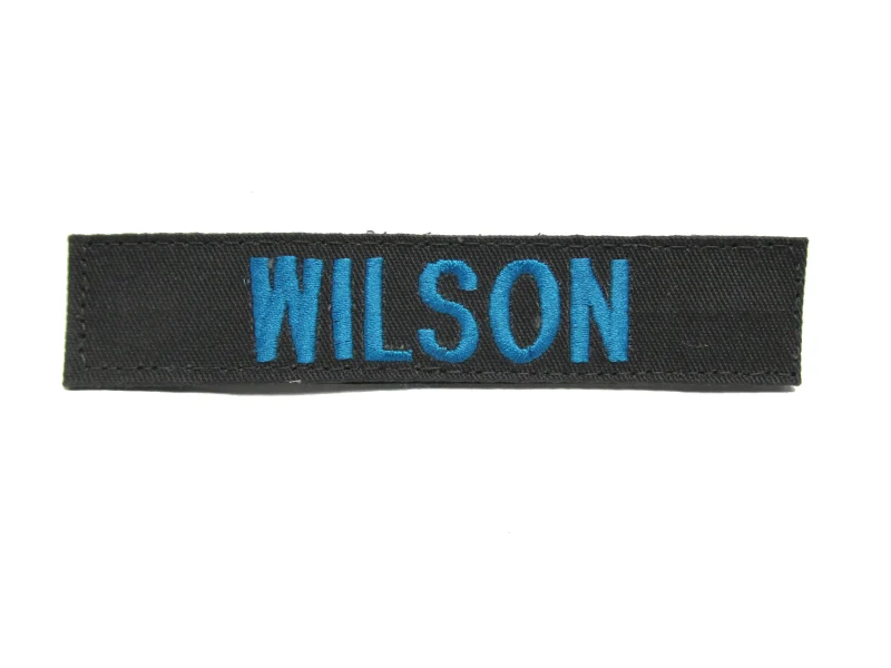 gray fabric name tape with hook fastener scaled